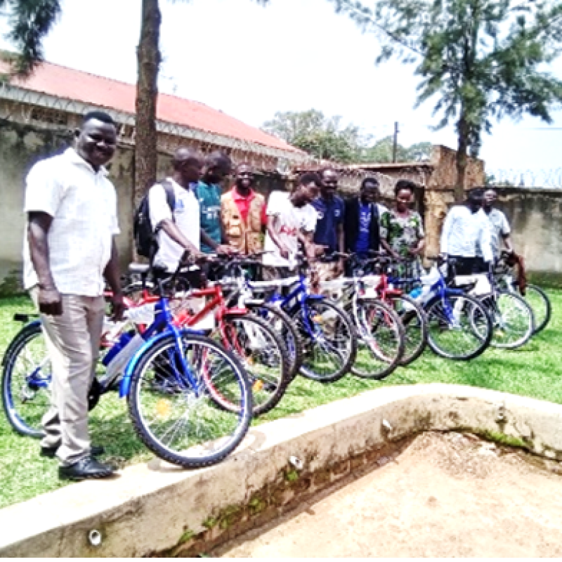 Health workers from the 9 health facilities
receiving their bicycles from the SPEDP  Office